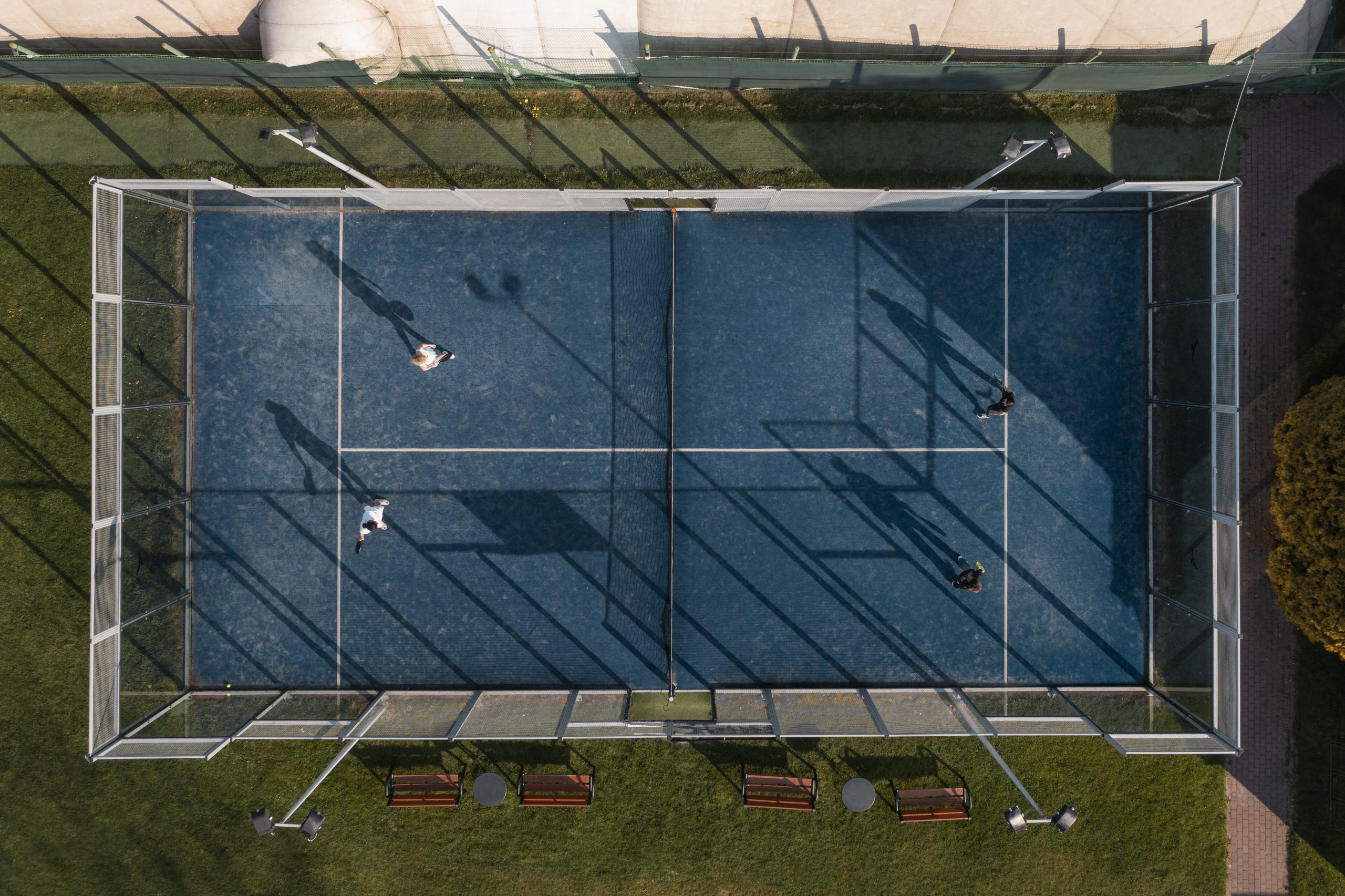 top view people playing paddle tennis scaled